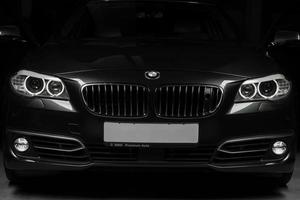 Tashkent, Uzbekistan - August 26, 2014 - the front of the car brand BMW black color photo