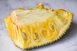 Jackfruit on white plate background, slide ripe jackfruit  tropical fruit fresh, jackfruit seed photo