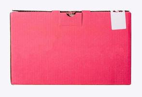 Pink cardboard box on a white background. photo