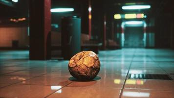 old soccer ball in empty subway video