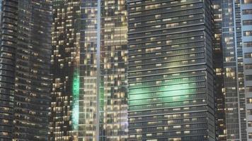 Night architecture of skyscrapers with glass facade video