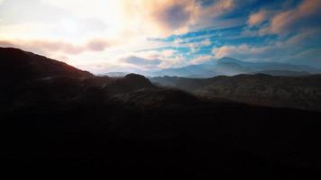 black volcanic dust and mountains with fog in background video