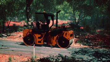 road roller tractor in the forest video