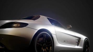 luxury sport car in dark studio with bright lights video