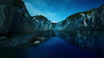 near the limestone cliffs in the ocean video