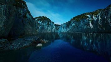 near the limestone cliffs in the ocean video