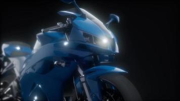 moto sport bike in dark studio with bright lights video