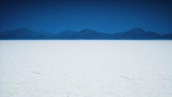 Bonneville Salt Flats landscape with rain storm clouds in distance video