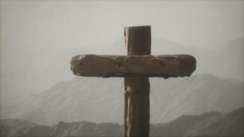 wooden Crucifix cross at mountain video