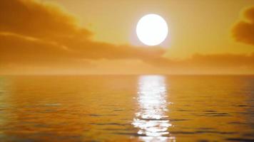 twilight sky in colorful bright sunlight reflects off on the water surface video