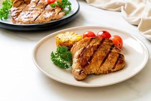 grilled and barbecue fillet pork steak with vegetable photo