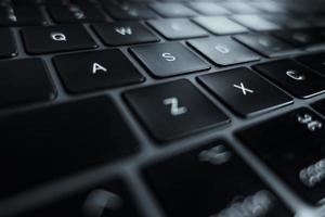 Close-up of laptop keyboard with focus on S button photo