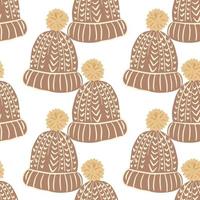 Isolated seamless pattern with beige knitted wool hat shapes. White background. vector