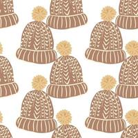 Isolated seamless pattern with beige knitted wool hat shapes. White background. vector