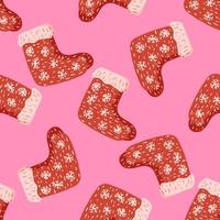 Bright xmas seamless doodle pattern with ornamental red winter shoes elements. Pink background. vector