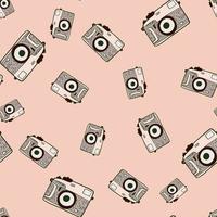 Photo camera vintage seamless pattern. Retro photo cameras design. Repeated texture in doodle style. vector