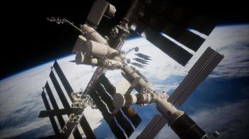 A view of the Earth and a spaceship. ISS is orbiting the Earth video