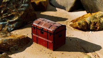 treasure chest in sand dunes on a beach video