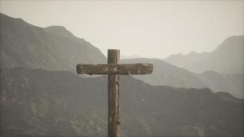 wooden Crucifix cross at mountain video