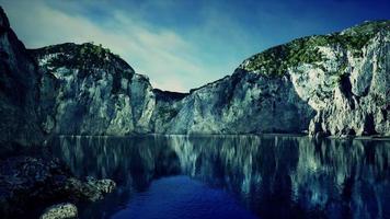 near the limestone cliffs in the ocean video