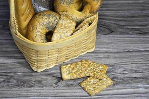 The cookie lies next to the bread basket. photo