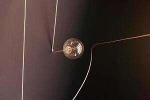 Naked hanging bulb photo