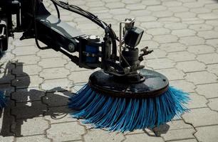 Street sweeper washing garbage photo