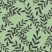 Black leaf branches silhouettes random seamless pattern in doodle style. Pale green background. vector