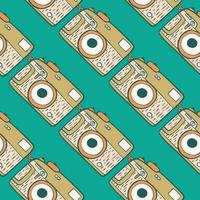 Photo camera vintage seamless pattern. Retro photo cameras design. Repeated texture in doodle style. vector