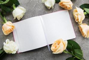 Roses and notebook photo