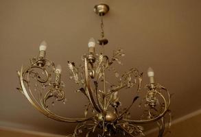 Crystal chandelier in room photo