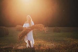 Beautiful teenage in field photo