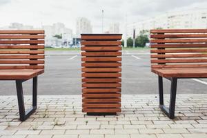 wooden bench in street photo