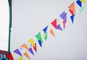 Multi colored triangular flags photo