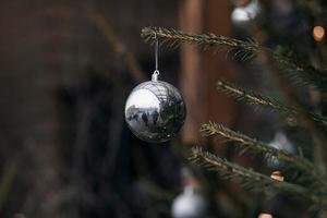 Christmas ball hanging on tree. photo