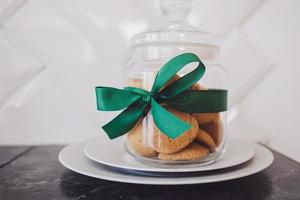 cookies in a jar with a festive ribbon photo