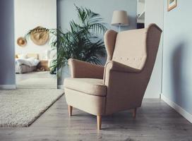 armchair on wooden floor photo