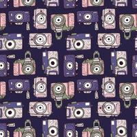 Seamless pattern cameras in doodle on dark background. Vintage texture retro camera for fabric with purple and pink colors. Modern hipster art in flat style. vector