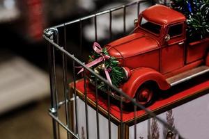 Red small retro toy truck photo