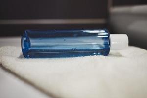 plastic blue bottle of antibacterial liquid soap photo