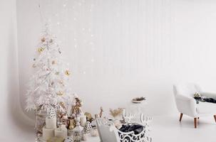 Christmas tree in the white room photo