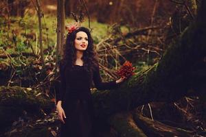 sweet lady in a magical forest photo