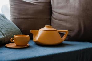Ceramic teapot with cups. photo