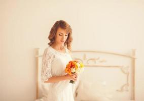 young woman with flowers photo