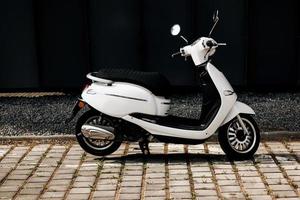 traditional white vintage moped photo