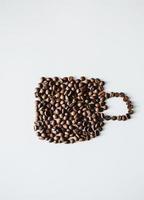 coffee beans in form cup photo