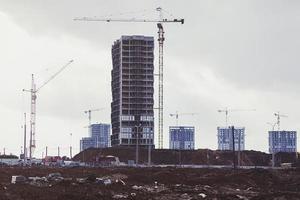 Construction site with cranes photo