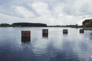 stone steps in the lake photo