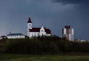 church against a dark sky photo