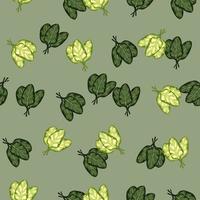 Seamless pattern bunch spinach salad on pastel green background. Modern ornament with lettuce. vector